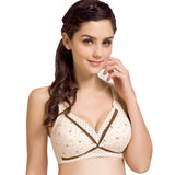 Woman wearing a beige bra with floral patterns on a white background