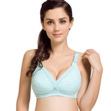 Woman wearing a light blue bra on a white background