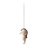 Crocheted seahorse ornament hanging