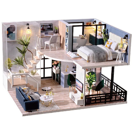 Model of a modern apartment layout with living room, kitchen, and bedroom.