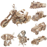 Collection of wooden mechanical models, including a motorcycle, truck, airplane, and car.
