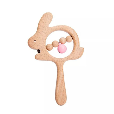 Wooden baby rattle with pink bead on a white background
