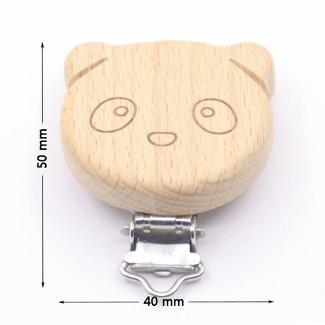 Wooden pacifier clip with cat face design and measurements on a white background