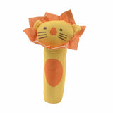 Yellow lion-shaped rattle with orange accents on a white background