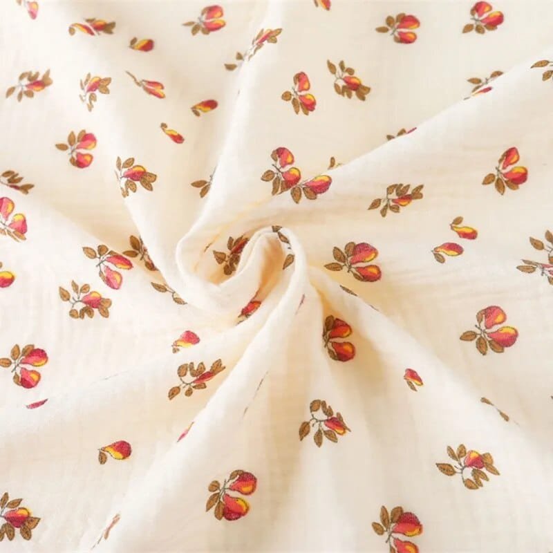 Fabric with floral pattern on a beige background
