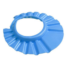 Angled view of the blue adjustable children shampoo bath cap for easy hair washing at home and at the sink.