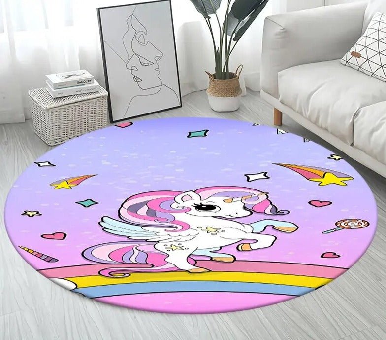 Adorable unicorn 3D area rug in a large round shape as a nursery floor mat for tummy time and quiet play.