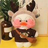 Plush toy with deer antlers and glasses on a yellow surface