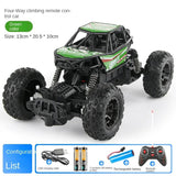 Green and black four-way climbing remote control car with accessories 