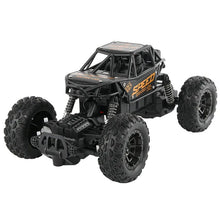 Black off-road toy vehicle with large wheels.