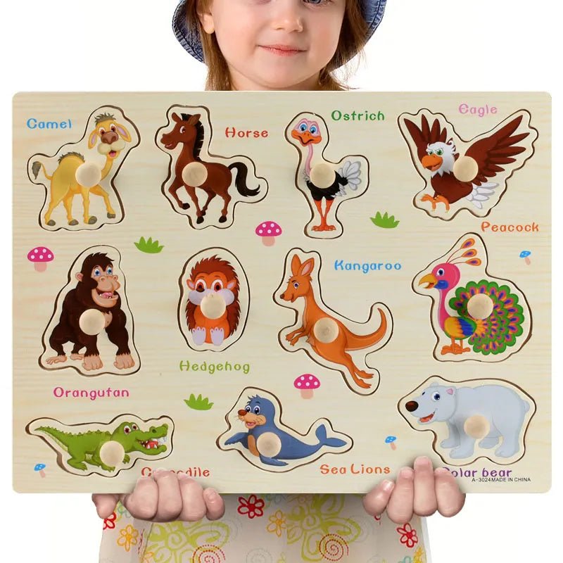 Child holding a Montessori wooden animal figure puzzle with labels for tactile shape matching practice.