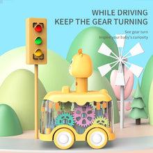 Deer animal press gear car with visible gears beside a toy traffic light