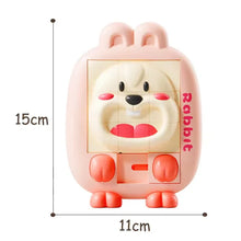 Pink rabbit slide puzzle toy with size markers of 15 cm tall and 11 cm wide
