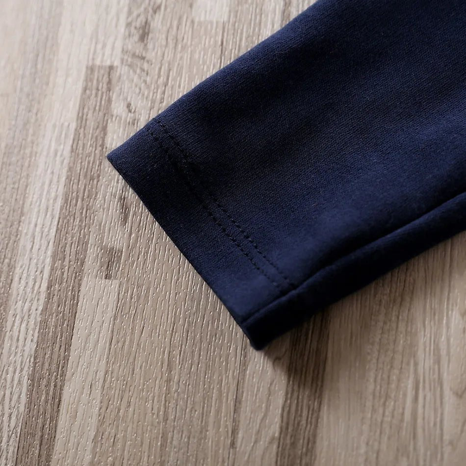 Navy blue fabric rolled