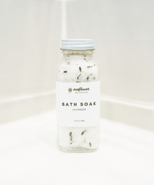 Bottle of bath soak with lavender scent
