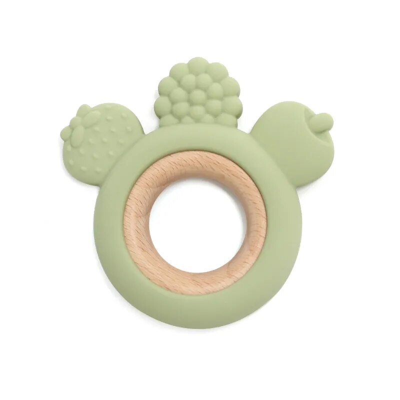 Green teething ring with wooden center.