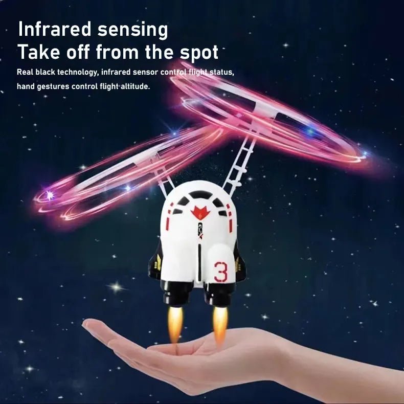 Rocket-shaped astronaut drone toy launched by hand for outdoor flying adventures.