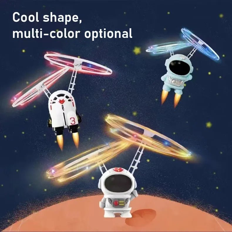 Astronaut and spaceship toy figures displayed against a space-themed backdrop for imaginative play.