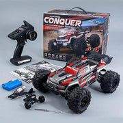 Toy truck with remote control and packaging on a gray background