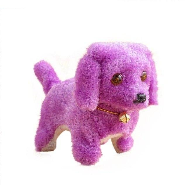 Purple plush dog toy with a gold bell on a white background