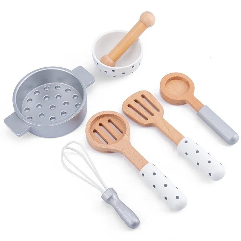 Set of wooden and gray kitchen utensils on a white background
