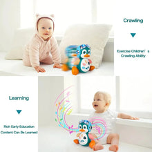 Two babies playing with the Musical Penguin Crawling Toy during floor time and crawling practice.