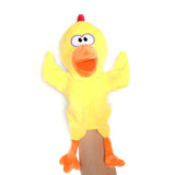 Yellow duck plush toy with orange feet and beak.