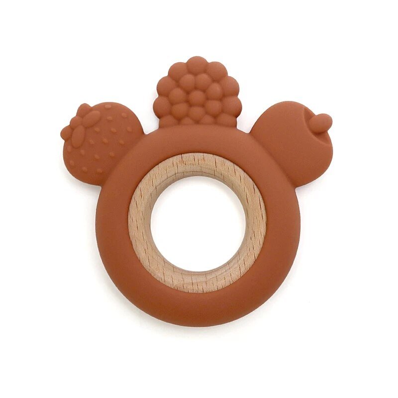 Brown teething ring with acorn design.
