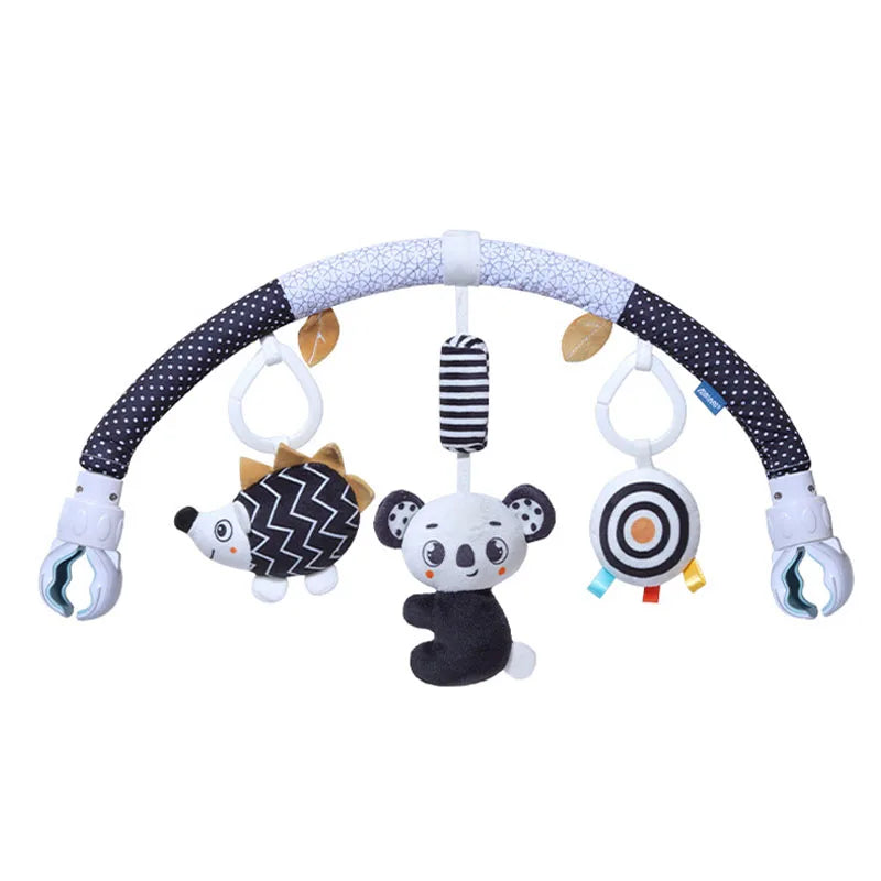 Baby arch toy for stroller with hedgehog, panda, and fish designs for chimes and play.