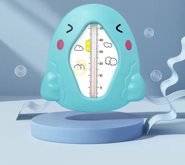 Baby Bath Thermometer cartoon float sitting in blue bath water for safe, comfortable infant bathing every day.