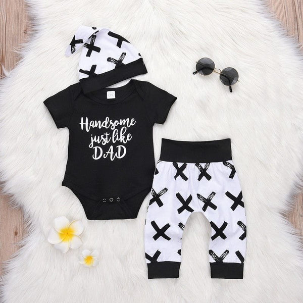 Baby boy black bodysuit with printed pants and hat three-piece set for daily wear and newborn photo sessions.