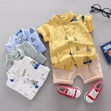 Baby boy yellow shirt and beige shorts lightweight suit for hot days and comfortable play.