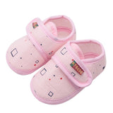 Pink children's slippers with geometric patterns 