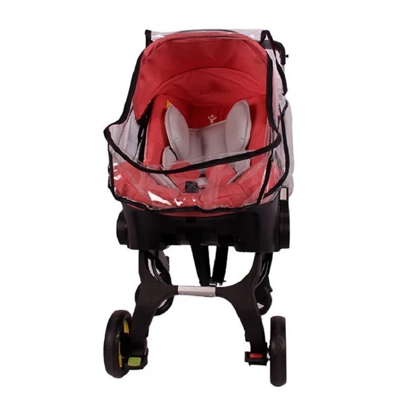 Baby carriage with clear plastic wind guard cover shielding red stroller from wind and rain.