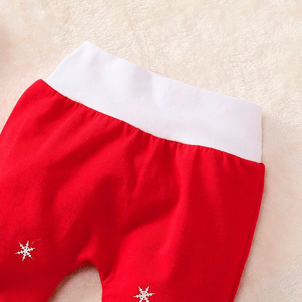 Baby Christmas snowflake print pyjama bottoms for warm festive sleepwear and cosy winter nights.