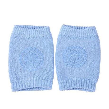 Pair of light blue knitted baby leg warmers.