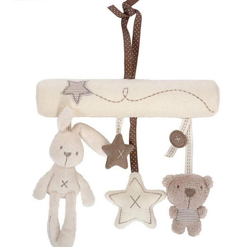 Baby crib play bed with hanging bell musical toy for newborn sleep time and sensory stimulation.