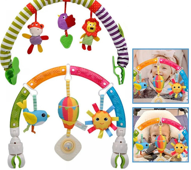 Colorful baby crib mobile with hanging toys and a baby using it.