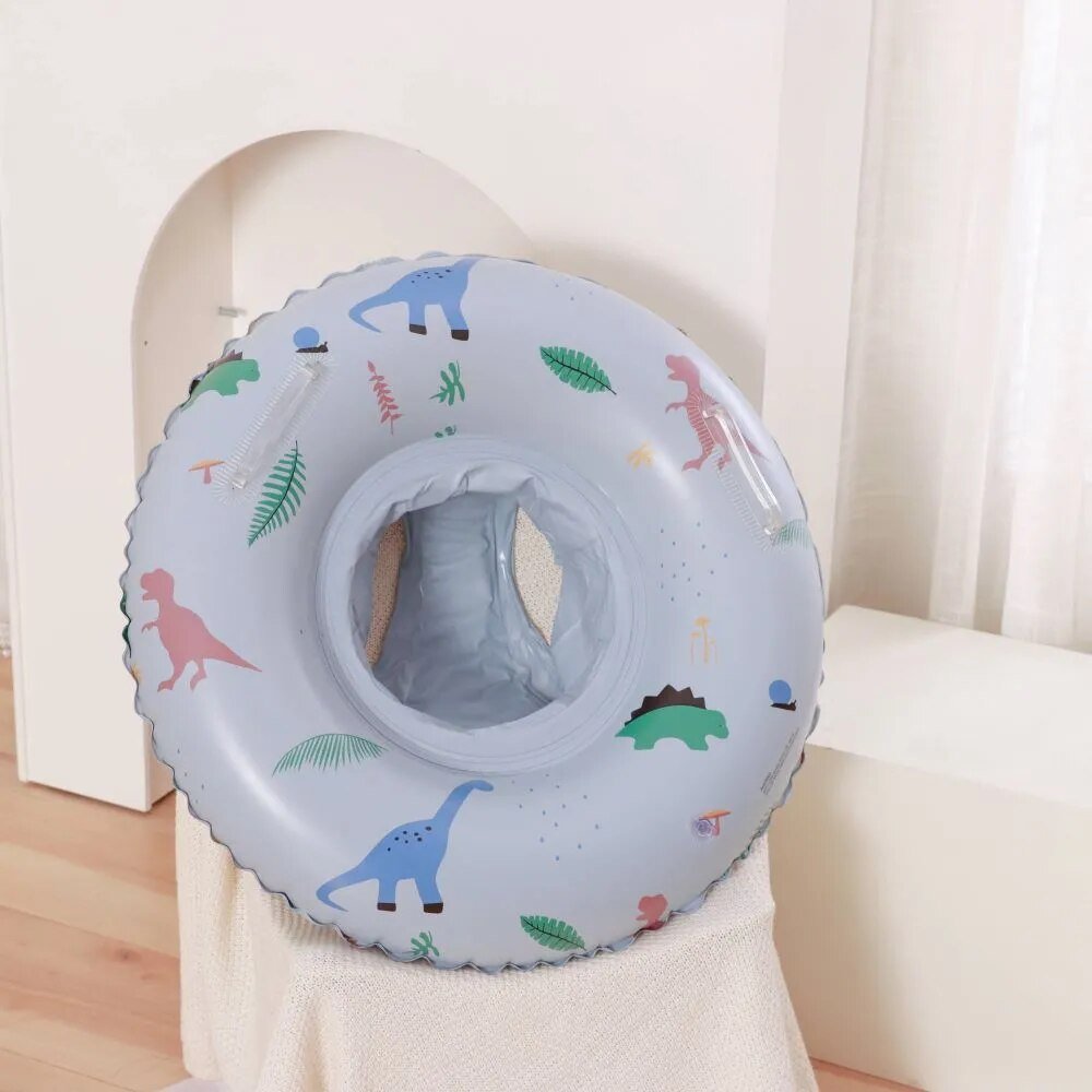 Inflatable neck ring with dinosaur pattern on a chair