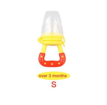 Yellow and red baby bottle with pacifier attachment.