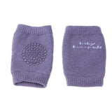 Pair of purple baby knee pads with textured surface and 'baby knee pads' text.