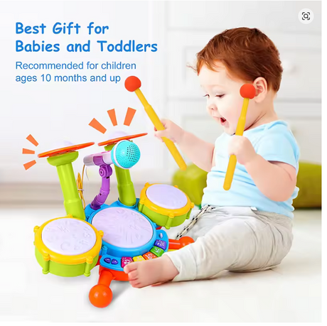 Child playing with a colorful toy drum set.