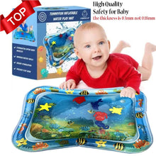Baby playing on an inflatable Kids Water Play Mat during outdoor summer fun in the backyard.