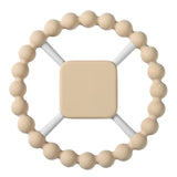 Beige teething ring with a square center.