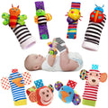 4-Piece Baby Rattle and Foot Finder Socks Set with animal designs for sensory play and early motor skill development.