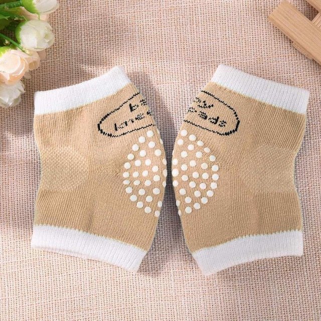 Beige skin-friendly baby crawling knee pads for soft contact against sensitive newborn and infant skin.