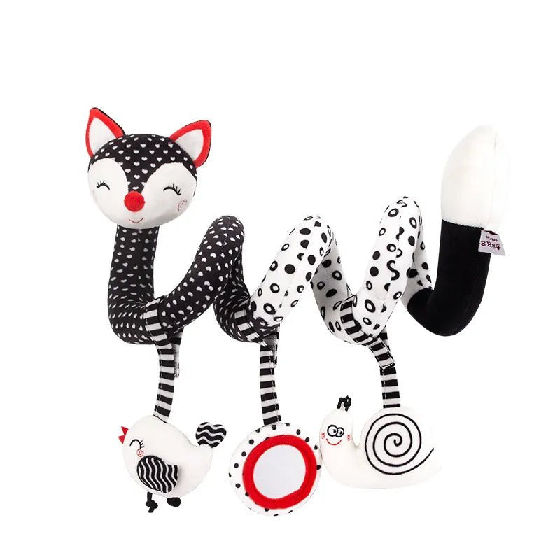 Black and white fox-shaped rattle toy with red accents.