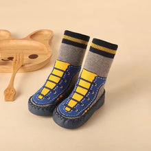 Color Matching Baby Sock Shoes soft-soled sneakers shown with their gift-ready packaging box.