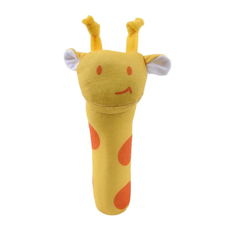 Yellow giraffe-shaped toy with orange spots.