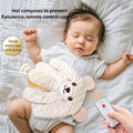 Baby lying down with a cream bear-face palm pillow on the tummy and a hand holding a remote control